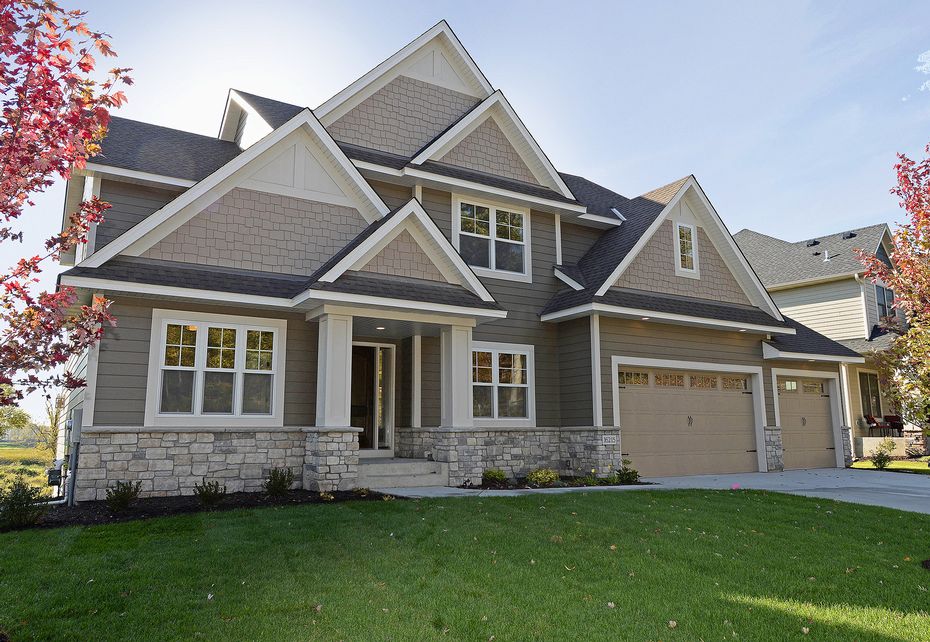 Hardie boards siding contractors installation on a private house 